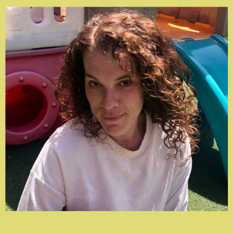 Amber Scatina, head teacher at Pickles Preschool, outside by the play structure.